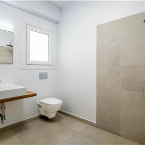 4 bedroom villa with infinity pool and sea view in Perithia, Corfu, sleeps 9